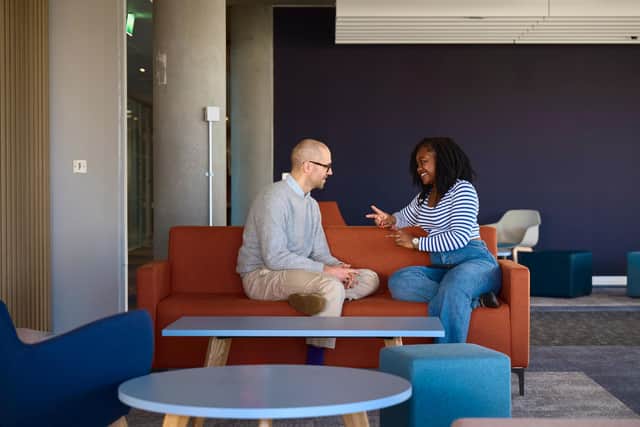 Student in discussion with lecturer at QMU's Learning Resource Centre