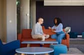 Student in discussion with lecturer at QMU's Learning Resource Centre