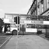 An Eastern Scottish bus rolled backwards, crashing through the railings of a York Place flat in Edinburgh, May 1988   Pic: George Smith