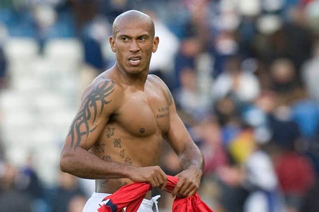 Chris Iwelumo walking off the park after his debut against Norway in 2008. Picture: SNS