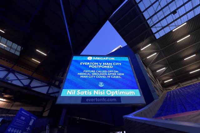 A big screen graphic announcing the fixture being called off before the expected Premier League match between Everton and Manchester City at Goodison Park on December 28 2020 in Liverpool, England. (Photo by Tony McArdle/Everton FC via Getty Images)