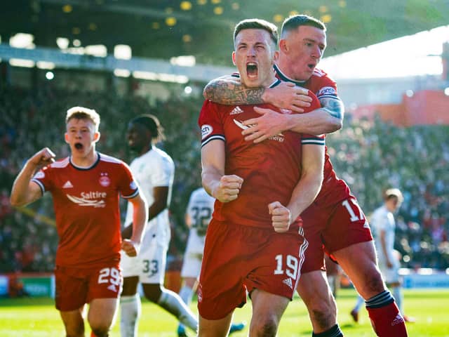 Lewis Ferguson celebrates after scoring his second penalty in the 2-1 win over Hibs. (Photo by Craig Foy / SNS Group)