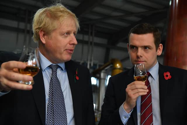 Boris Johnson with Douglas Ross during the 2019 general election campaign.