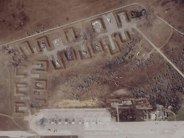 A zoom in on the Saky airbase on 10 August - after the explosions. Several damaged warplanes are visible as well as craters in the ground from blasts. Ukraine's air force said about a dozen Russian warplanes were destroyed, although Russia denied that any aircraft had been damaged.