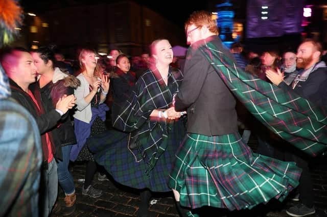Edinburgh's Hogmanay street party could be banished from next year after research found mass gatherings were the least popular element of the capital's festive calendar. PIC: PA/Andrew Milligan.