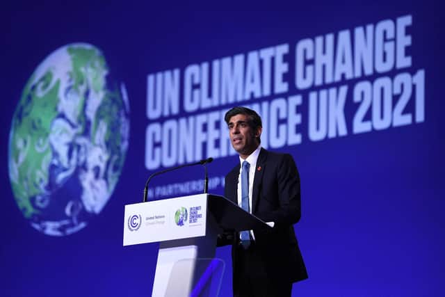 Under proposals announced by Chancellor Rishi Sunak at COP26, financia l institutions require to publish their net-zero transition plans from 2023. (Photo by DANIEL LEAL/AFP via Getty Images)