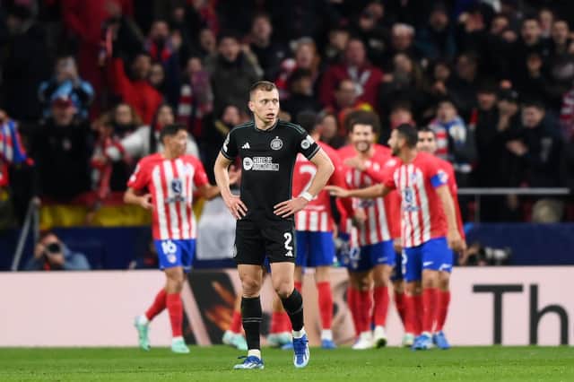 Celtic's Alistair Johnston looks dejected after Samuel Lino of Atletico Madrid (not pictured) scores his team's fourth goal. (Photo by Justin Setterfield/Getty Images)