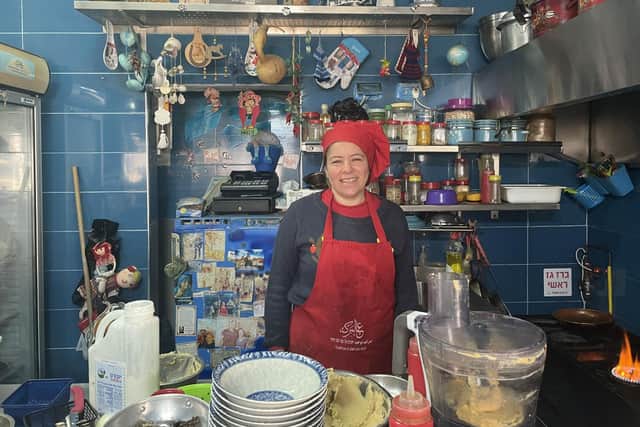 Chef and owner Areen at her seafront Akko restaurant, Hummus El Abed Abu Hmid. Pic: PA Photo/Jemma Crew.