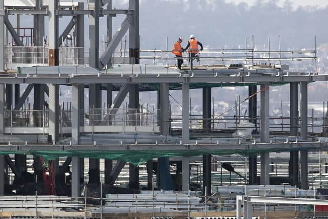 Workers on the site of the new St James Quarter development in Edinburgh city centre during its construction. Picture: Jane Barlow/PA Wire