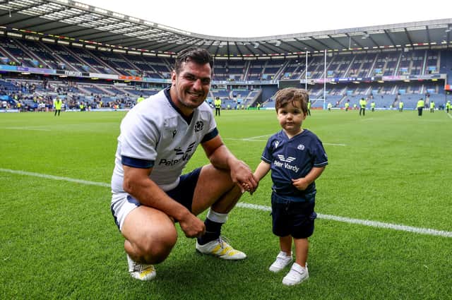 Stuart McInally with his son Oliver after the Scotland v Italy warm-up game at Scottish Gas Murrayfield. McInally has been called in the Scotland World Cup squad to replace David Cherry.  (Photo by Ben Brady/INPHO/Shutterstock)