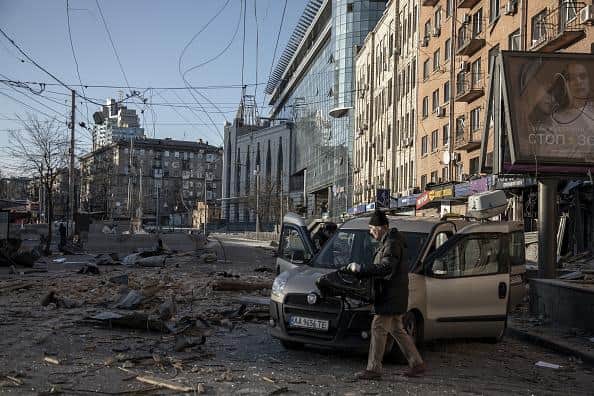 Ukrainian residents collect their belongings from a residential building hit by a missile explosion in Lukianivska, Shevchenko district in Kyiv, Ukraine. Picture: Narciso Contreras/Anadolu Agency via Getty Images