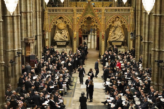 Guests arrive for the State Funeral of Queen Elizabeth II, held at Westminster Abbey, London. Picture date: Monday September 19, 2022.