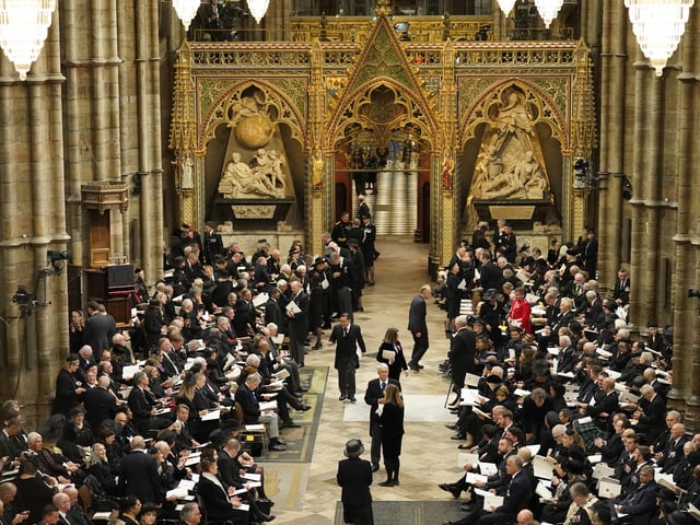 Guests arrive for the State Funeral of Queen Elizabeth II, held at Westminster Abbey, London. Picture date: Monday September 19, 2022.
