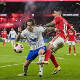 Benfica's Angel Di Maria, right, and Rangers' Fabio Silva vie for the ball at the Estadio da Luz.