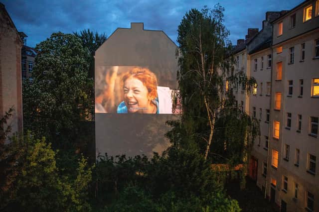 The Cinescapes film festival has been inspired by the "Windowflicks" events in Berlin, which beamed movies into courtyards during the pandemic lockdown. PIC: Maja Hitij/Getty Images.