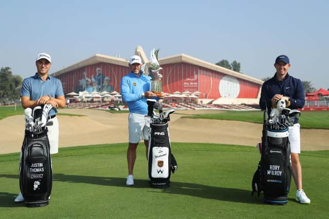 Justin Thomas, Lee Westwood and Rory McIlroy pose for a photograph ahead of the Abu Dhabi HSBC Championship at Abu Dhabi Golf Club. Picture: Warren Little/Getty Images.