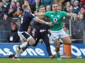 James Lowe of Ireland hands off Kyle Steyn of Scotland during the Six Nations Rugby match between Scotland and Ireland at Murrayfield Stadium on March 12, 2023 in Edinburgh, Scotland. (Photo by David Rogers/Getty Images)
