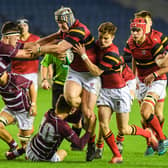 Stewart Melville’s Mikey Jones, now a pro with Edinburgh Rugby, is tackled during the Boys School Under 18 Cup Final against George Watson's College in December 2019. (Photo by Paul Devlin / SNS Group / SRU)