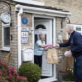 Volunteers, such as people who delivered food parcels to elderly people during the Covid pandemic, benefit from the knowledge they are making a difference in the world (Picture: Dan Kitwood/Getty Images)