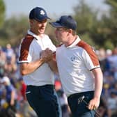 Justin Rose and Robert MacIntyre of Team Europe celebrate after the Scot holed a key birdie putt on the 13th green during the Saturday afternoon fourball matches in the 44th Ryder Cup at Marco Simone Golf & Country Club in Rome. Picture: Ross Kinnaird/Getty Images.