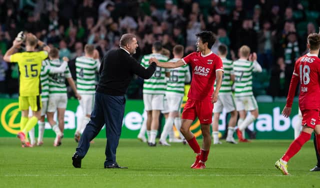 Celtic manager Ange Postecoglou acknowledges AZ's Yukianri Sugawara at full time following his team's 2-0  Europa League play-off victory. (Photo by Ross Parker / SNS Group)