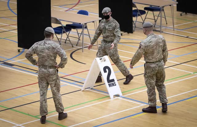 Members of the Royal Scots Dragoon Guard carry out a reconnaissance before setting up a Covid–19 vaccination centre at the Ravenscraig Regional Sports Facility in Motherwell, Lanarkhire. Picture date: Monday January 18, 2021.