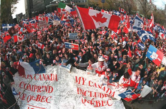 Thousands of Canadians rally in Montreal in October 1995 in a bid to persuade citizens of Quebec not to secede from Canada (Picture: Andre Pichette/AFP via Getty Images)