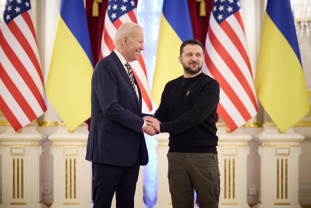 Photo issued by the Office of the President of Ukraine of President Volodymyr Zelensky welcoming US President Joe Biden to Kyiv, Ukraine