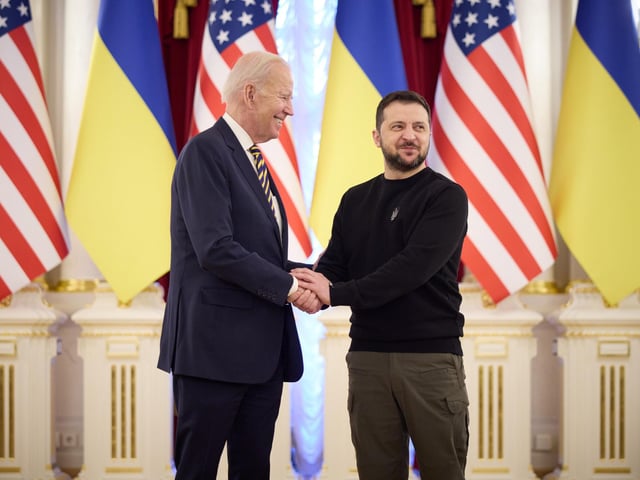 Photo issued by the Office of the President of Ukraine of President Volodymyr Zelensky welcoming US President Joe Biden to Kyiv, Ukraine