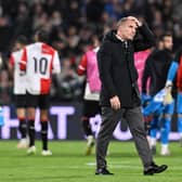 Brendan Rodgers trudges off after Celtic's 2-0 defeat by Feyenoord in Rotterdam.