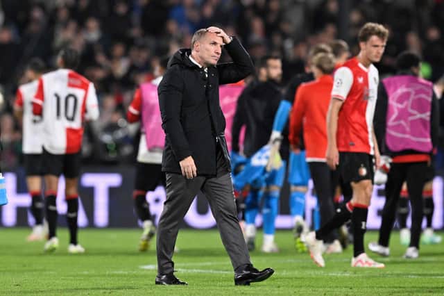 Brendan Rodgers trudges off after Celtic's 2-0 defeat by Feyenoord in Rotterdam.