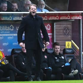 Hearts boss Robbie Neilson hailed his squad after the win over Dundee United. (Photo by Ross Parker / SNS Group)