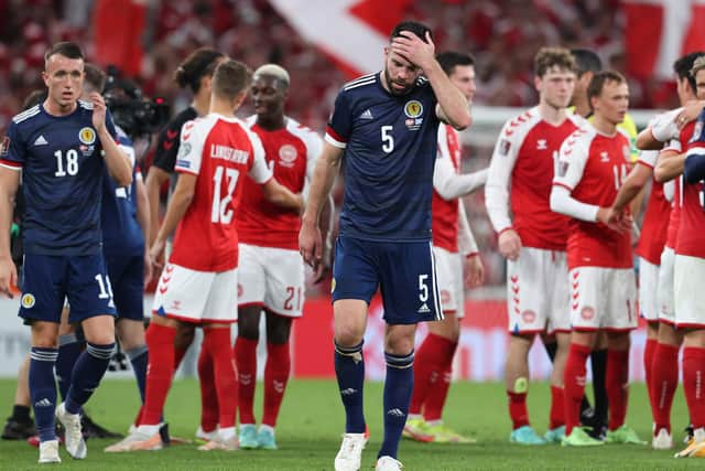 Grant Hanley, seen here after the 2-0 defeat to Denmark in Copenhagen, was booked in Scotland's last outing against Austria. The defender misses Saturday's World Cup qualifier with Israel due to suspension. (Photo by Alan Harvey / SNS Group)