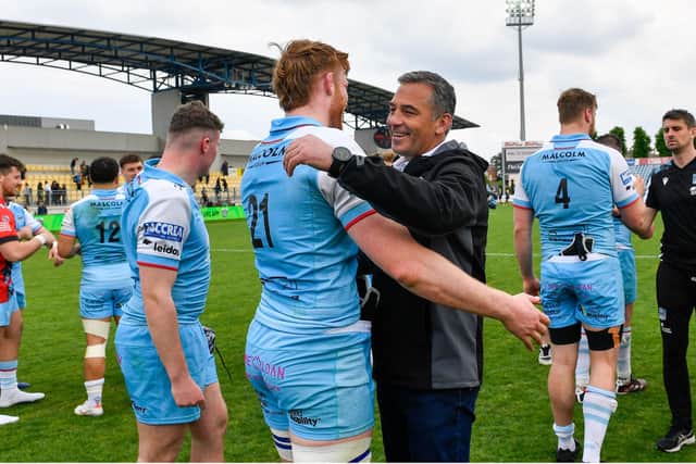Glasgow Warriors head coach Franco Smith with Gregor Brown after the win over Zebre in Parma on Saturday. Pic: Luca Sighniolfi/INPHO/Shutterstock (14452500ap)