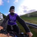Lady Bathurst, 58, is narrowly missed by an overtaking car whilst cycling for charity. Picture: Tom Wakefield/Cotswold TV/SWNS