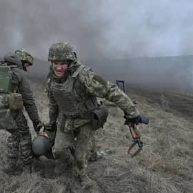 The brutal war in Ukraine shows the threat posed by Vladimir Putin and the UK must prepare its Armed Forces (Picture: Genya Savilov/AFP via Getty Images)