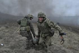 The brutal war in Ukraine shows the threat posed by Vladimir Putin and the UK must prepare its Armed Forces (Picture: Genya Savilov/AFP via Getty Images)