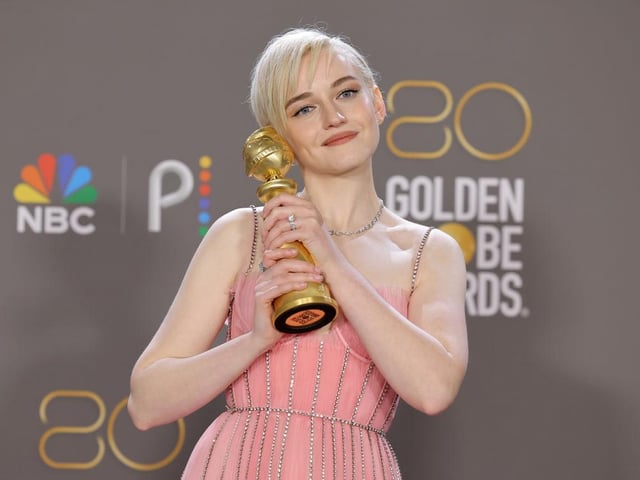 Julia Garner poses with the Best Supporting Actress in a Television Series – Musical-Comedy or Drama award for  her role in TV hit Ozark.