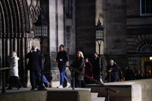 Mourners enter St Giles' Cathedral to pay their respects to The Queen