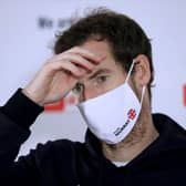Andy Murray speaks at a press conference after losing to Fernando Verdasco in Cologne.