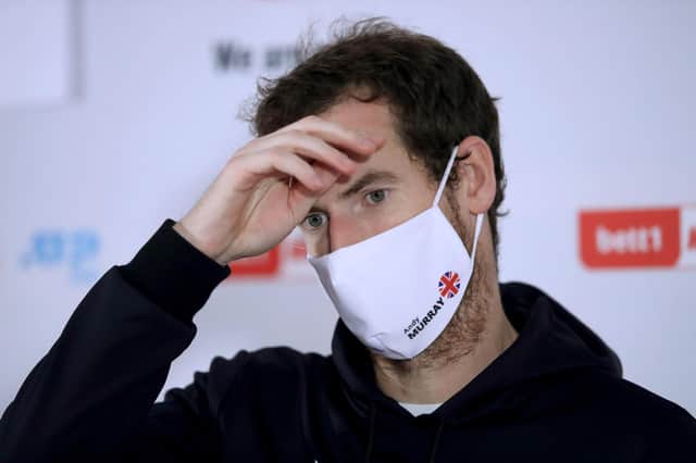 Andy Murray speaks at a press conference after losing to Fernando Verdasco in Cologne.