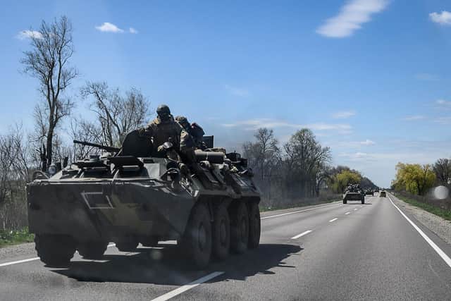 Ukrainian servicemen on an armoured personnel carrier (APC) on the outskirts of Kryvyi Rih. (Photo Ed Jones/AFP via Getty Images)