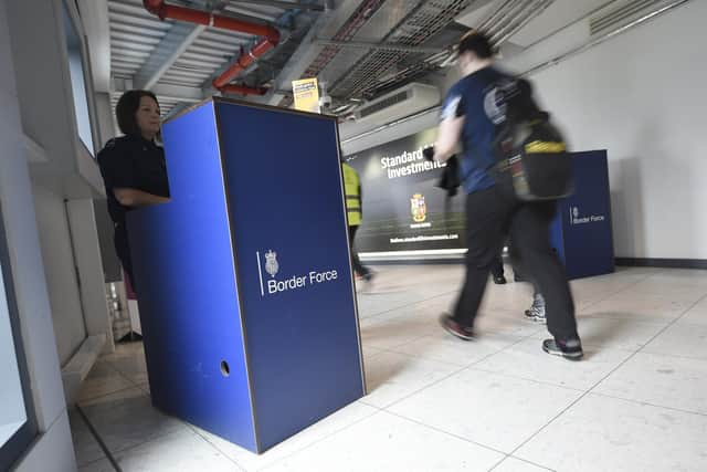 Border Force officials compelled arriving passengers to prove they had bought Covid test kits before being allowed to pass. Picture: Greg Macvean (2017)