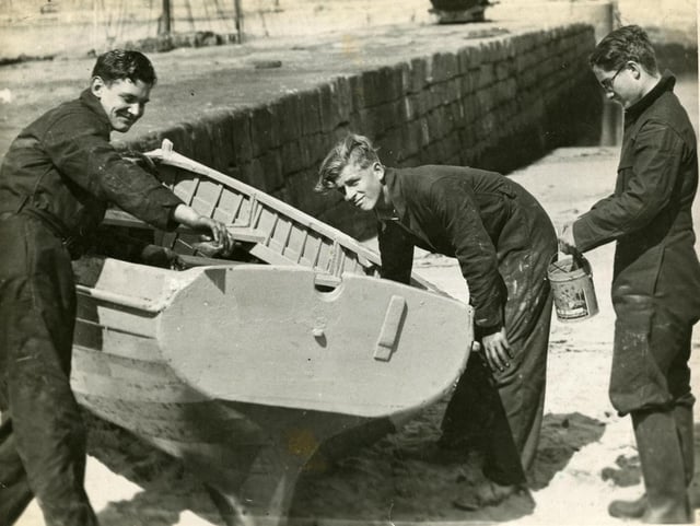 Prince Philip maintains a boat with fellow pupils at Hopeman Harbour as part of his sailing education at Gordonstoun. PIC: Gordonstoun School