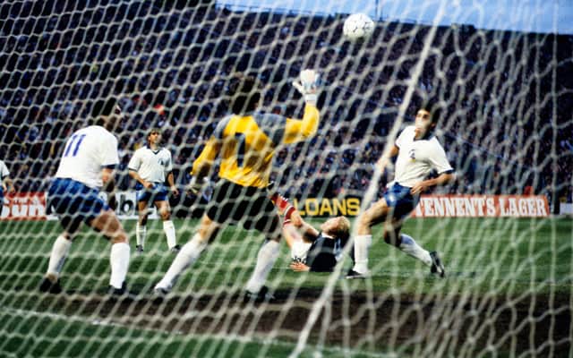 Scotland striker Mo Johnston (grounded) sees his spectacular effort go in against Cyprus