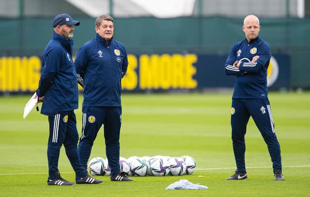 Steve Clarke, John Carver and Steven Naismith during a training session at the Oriam.