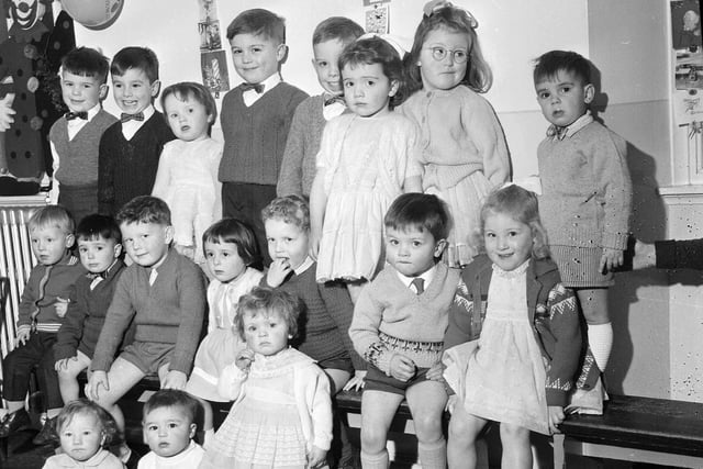 Edinburgh toddlers at their playgroup's Christmas Party on the Pleasance in 1962.