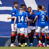 Rangers players celebrate with Alfredo Morelos after the striker had scored to put his team 2-1 up against Celtic at Ibrox. (Photo by Craig Williamson / SNS Group)