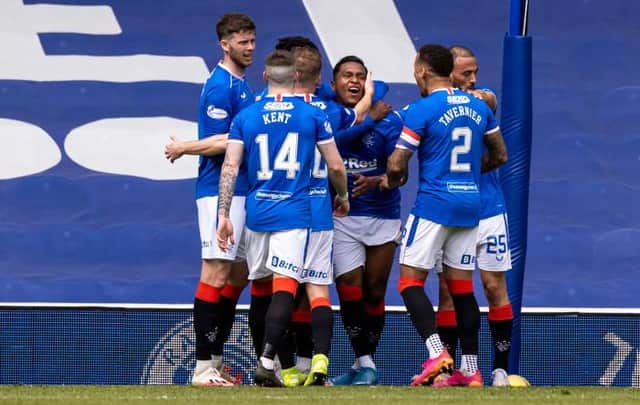 Rangers players celebrate with Alfredo Morelos after the striker had scored to put his team 2-1 up against Celtic at Ibrox. (Photo by Craig Williamson / SNS Group)