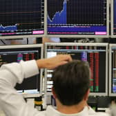 Stock markets around the world fell on fears that the new Covid strain could hamper economic recovery. Picture: Daniel Leal-Olivas/AFP/Getty Images